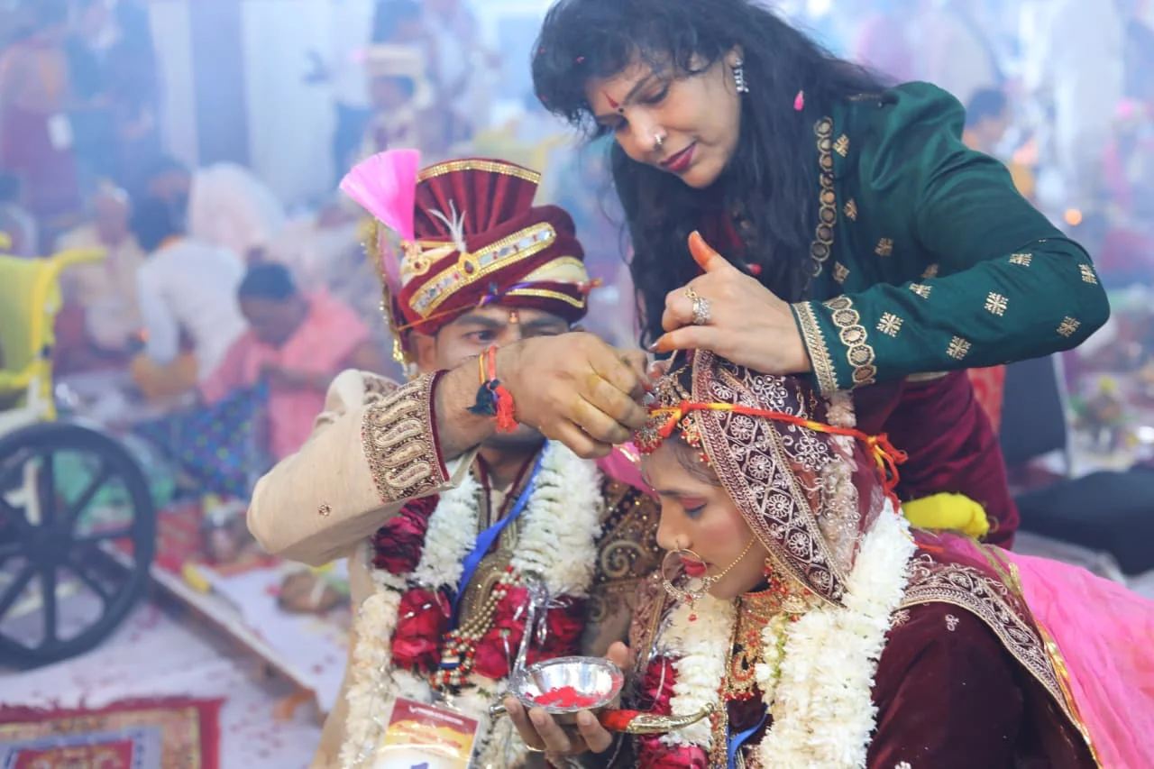 Differently-abled couples at mass wedding event